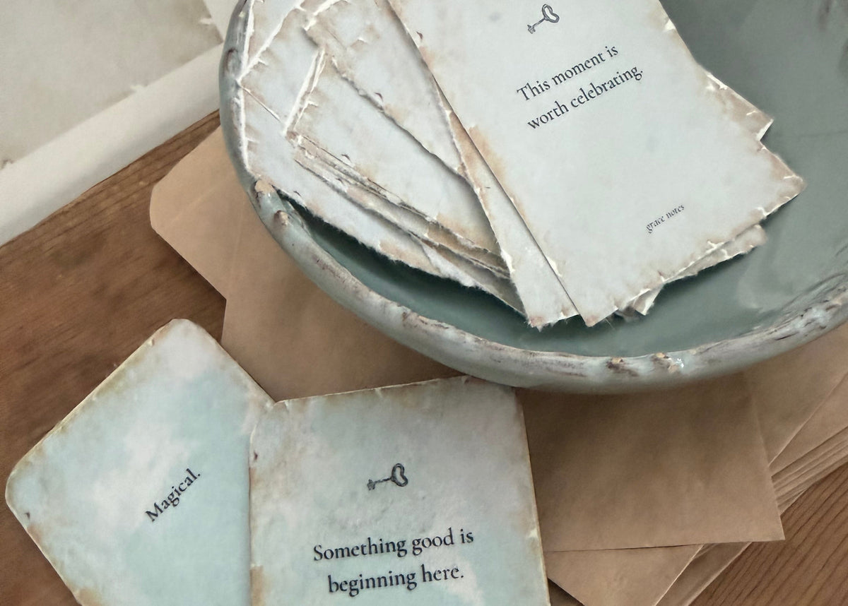 Stack of cards with text on a wooden surface